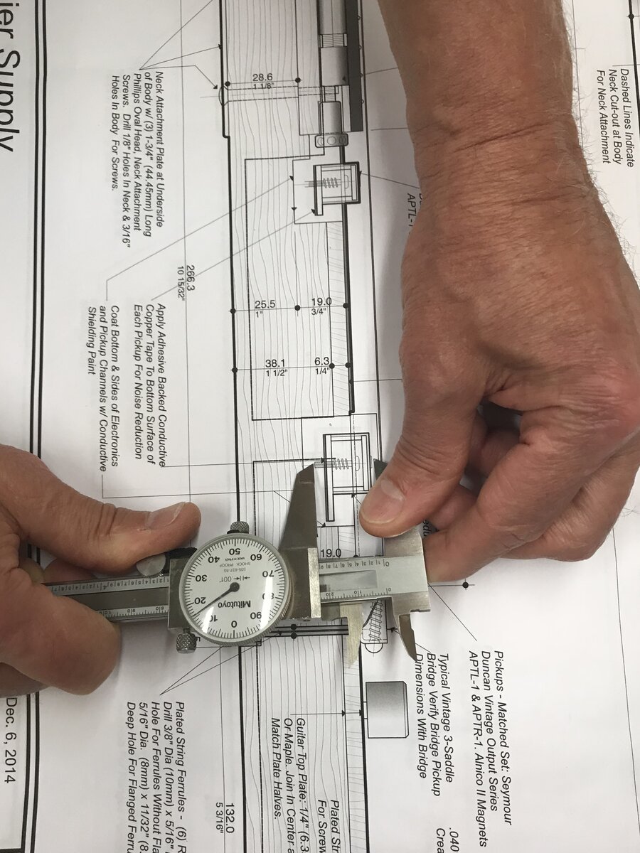 Blueprint with caliper measuring